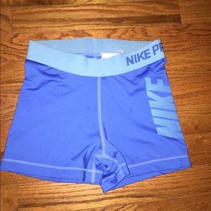 Blue Nike pros